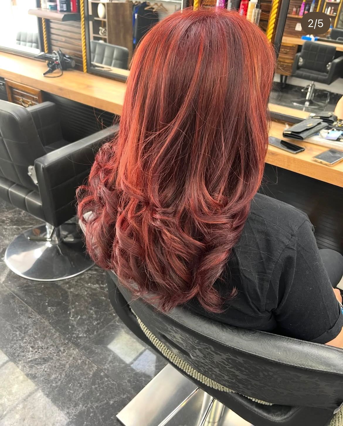 Vibrant red hair colour by hairdresser in Finchley Central
